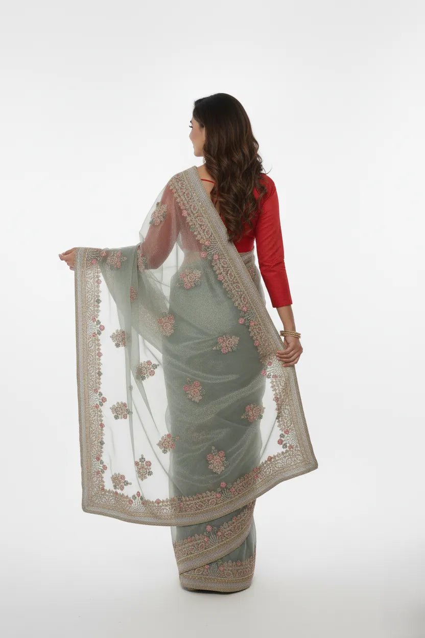 Aarohi Pastel Embroidered Net Saree